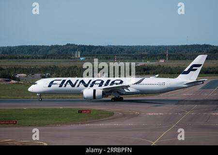 Helsinki / Finland - SEPTEMBER 7, 2023: Helsinki-Vantaa Airport EFHK.An Airbus A350, operated by Finnair, landing at Helsinki Airport. Stock Photo