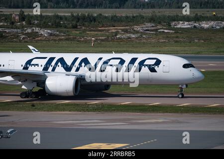Helsinki / Finland - SEPTEMBER 7, 2023: Helsinki-Vantaa Airport EFHK.An Airbus A350, operated by Finnair, landing at Helsinki Airport. Stock Photo