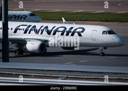 Helsinki / Finland - SEPTEMBER 7, 2023: Helsinki-Vantaa Airport EFHK. An Embraer E190, operated by Finnair, taxiing at Helsinki airport. Stock Photo