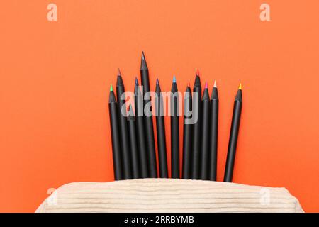 top view of set of black graphite pencils on hand-drawn academic