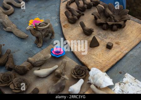 A display of traditional Pakistani mud toys at a bustling market fair in Islamabad, Pakistan Stock Photo