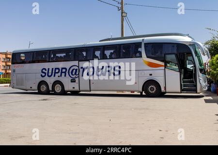 Marrakech, Morocco - August 28, 2023 People traveling in a Supratours bus between Marrakech and Agadir. The price is cheap and the service excellent. Stock Photo