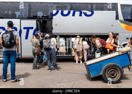 Marrakech, Morocco - August 28, 2023 People traveling in a Supratours bus between Marrakech and Agadir. The price is cheap and the service excellent. Stock Photo