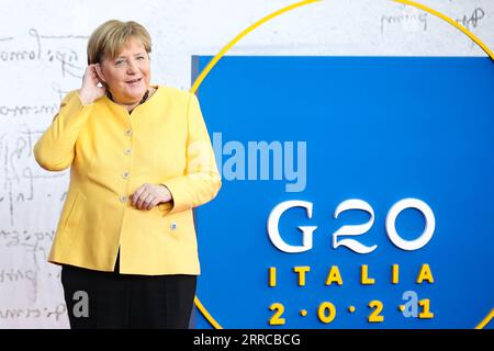 211030 -- ROME, Oct. 30, 2021 -- German Chancellor Angela Merkel arrives for the Group of Twenty G20 Leaders Summit in Rome, Italy, Oct. 30, 2021. The 16th G20 Leaders Summit kicked off here on Saturday.  ITALY-ROME-G20 SUMMIT ZhangxCheng PUBLICATIONxNOTxINxCHN Stock Photo