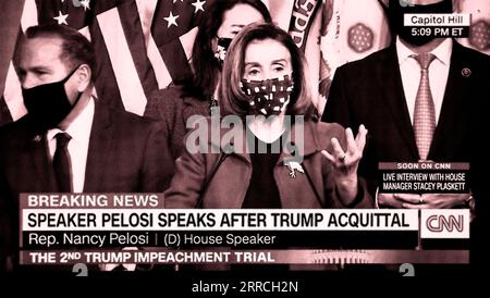 A CNN screenshot (digitally colorized) of House Speaker Nancy Pelosi speaking after the Senate again acquitted Donald Trump of impeachment charges. Stock Photo
