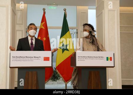 211129 -- DAKAR, Nov. 29, 2021 -- Chinese State Councilor and Foreign Minister Wang Yi L and Senegalese Foreign Minister Aissata Tall Sall attend a joint press conference in Dakar, Senegal, Nov. 28, 2021.  SENEGAL-DAKAR-WANG YI-SENEGALESE FM-PRESS CONFERENCE LiuxChang PUBLICATIONxNOTxINxCHN Stock Photo