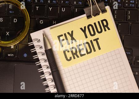 Writing note shows the text Fix your credit. Stock Photo