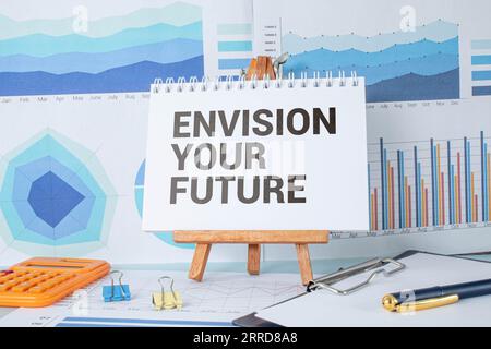 Retro effect and toned image of a fountain pen on a notebook. Handwritten text Envision Your Future as business concept image Stock Photo