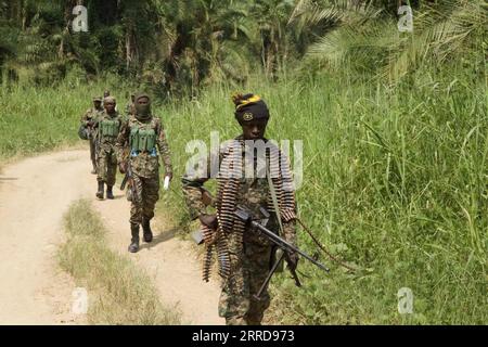 Bilder des Jahres 2021, News 12 Dezember News Themen der Woche KW49 News Bilder des Tages 211212 -- , Dec. 12, 2021 -- Soldiers are seen during a joint military operation against armed forces in Beni territory, northeastern Democratic Republic of the Congo, Dec. 11, 2021. The Armed Forces of the Democratic Republic of the Congo FARDC and Uganda People s Defense Force UPDF on Saturday released the first assessment of their joint military operations against rebels of the Allied Democratic Forces ADF, conducted since Nov. 30 in Beni territory, northeastern DRC. TO GO WITH: DR Congo, Uganda declar Stock Photo