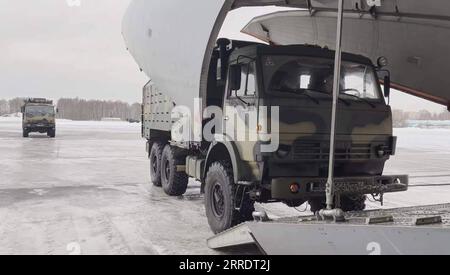 220107 -- MOSCOW, Jan. 7, 2022 -- Screenshot taken on Jan. 6, 2022 shows a truck boarding a military transport aircraft at the Chkalovsky airfield on the outskirts of Moscow, Russia. The Russian Aerospace Forces are delivering a contingent to Kazakhstan as part of a peacekeeping mission organized by the Collective Security Treaty Organization CSTO, the military bloc said Thursday. The Russian Defense Ministry/Handout via Xinhua RUSSIA-MOSCOW-CSTO-PEACEKEEPERS TO KAZAKHSTAN BaixXueqi PUBLICATIONxNOTxINxCHN Stock Photo