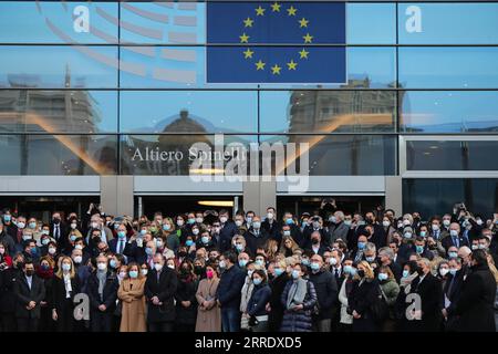220111 -- BRUSSELS, Jan. 11, 2022 -- People observe a moment of silence in memory of late European Parliament President David Sassoli, in front of the European Parliament in Brussels, Belgium, Jan. 11, 2022. European Parliament President David Sassoli died at age 65 at a hospital in Italy early Tuesday, his spokesperson has said. Sassoli, born on May 30, 1956, in Florence, Italy, had been hospitalized for more than two weeks due to a serious complication relating to immune system dysfunction. Sassoli was elected to the European Parliament in 2009. He became president of the European Parliament Stock Photo