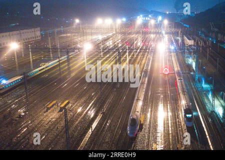 220117 -- GUIYANG, Jan. 17, 2022 -- Aerial photo taken on Jan. 16, 2022 shows bullet trains at a train depot in Guiyang, southwest China s Guizhou Province. The number of railway passenger trips during China s upcoming Spring Festival travel rush is expected to jump 28.5 percent from the holiday season last year, industry data shows. During the 40-day travel season, also known as chunyun, many Chinese people will travel to meet their families for the Chinese Lunar New Year, or Spring Festival, which will fall on Feb. 1, 2022.  CHINA-SPRING FESTIVAL-TRAVEL RUSH CN OuxDongqu PUBLICATIONxNOTxINxC Stock Photo