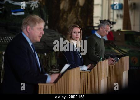 220302 -- TALLINN, March 2, 2022 -- Estonian Prime Minister Kaja Kallas C, Secretary General of the North Atlantic Treaty Organization NATO Jens Stoltenberg R and British Prime Minister Boris Johnson attend a joint press conference at the Tapa Army Base in northern Estonia, March 1, 2022. Visiting Secretary General of the North Atlantic Treaty Organization NATO Jens Stoltenberg on Tuesday stressed diplomatic efforts to solve the ongoing Ukraine crisis. Stoltenberg made the remarks at a joint press conference with Estonian Prime Minister Kaja Kallas and visiting British Prime Minister Boris Joh Stock Photo