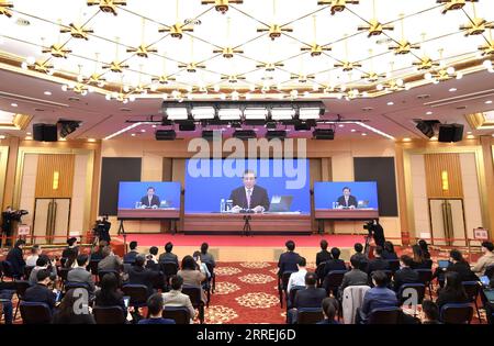 220304 -- BEIJING, March 4, 2022 -- Journalists attend a press conference of the fifth session of the 13th National People s Congress NPC via video link in Beijing, capital of China, March 4, 2022. The press conference was held via video link due to COVID-19 prevention and control requirements.  TWO SESSIONSCHINA-BEIJING-NPC-PRESS CONFERENCE CN ChenxZhonghao PUBLICATIONxNOTxINxCHN Stock Photo