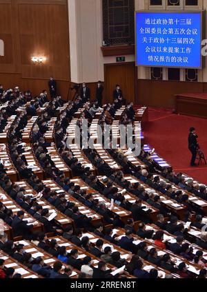 220310 -- BEIJING, March 10, 2022 -- The closing meeting of the fifth session of the 13th National Committee of the Chinese People s Political Consultative Conference CPPCC is held at the Great Hall of the People in Beijing, capital of China, March 10, 2022.  TWO SESSIONS CHINA-BEIJING-CPPCC-ANNUAL SESSION-CLOSING MEETING CN ChenxZhonghao PUBLICATIONxNOTxINxCHN Stock Photo