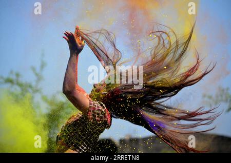 220316 -- BHOPAL, March 16, 2022 -- A college student celebrates Holi festival, the festival of colors, in Bhopal, capital of India s Madhya Pradesh state, March 16, 2022. Str/Xinhua INDIA-MADHYA PRADESH-BHOPAL-HOLI FESTIVAL JavedxDar PUBLICATIONxNOTxINxCHN Stock Photo