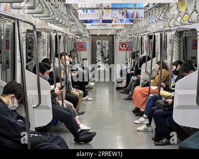 News Bilder des Tages  220316 -- TOKYO, March 16, 2022 -- Photo taken with a mobile phone shows passengers stranded in a JR Yokosuka Line train following an earthquake, Japan, March 16, 2022. A 7.3-magnitude earthquake hit northeastern Japan on Wednesday night, and tsunami waves were observed after the Japan Meteorological Agency issued a tsunami warning. Strong shaking was felt in the country s northeastern and eastern areas, especially in Miyagi and Fukushima Prefectures where the quake logged six upper on the Japanese seismic intensity scale which peaks at seven. The capital city of Tokyo a Stock Photo