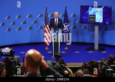 220325 -- BRUSSELS, March 25, 2022 -- U.S. President Joe Biden attends a press conference at the NATO Headquarters in Brussels, Belgium, March 24, 2022. NATO approved on Thursday the deployment of four new battle groups in the eastern part of the alliance, including Bulgaria, Hungary, Romania and Slovakia, declared Jens Stoltenberg, NATO s secretary general during a press briefing. In total, there will now be eight NATO battle groups deployed along the eastern flank of the alliance, from the Baltic Sea to the Black Sea.  BELGIUM-BRUSSELS-NATO-SUMMIT ZhengxHuansong PUBLICATIONxNOTxINxCHN Stock Photo