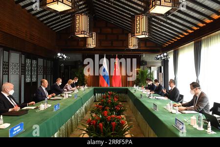 220330 -- HEFEI, March 30, 2022 -- Chinese State Councilor and Foreign Minister Wang Yi holds talks with Russian Foreign Minister Sergei Lavrov in Tunxi, east China s Anhui Province, March 30, 2022.  CHINA-ANHUI-WANG YI-RUSSIA-FM-TALKS CN ZhouxMu PUBLICATIONxNOTxINxCHN Stock Photo