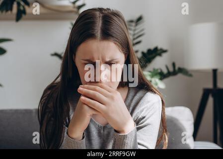 Upset young caucasian woman expression face thinking about problem, difficulty, feeling failure and exhausted, suffering from loneliness, grief sorrow Stock Photo