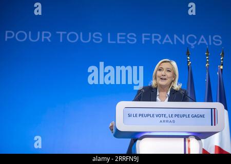 220421 -- ARRAS FRANCE, April 21, 2022 -- French far-right National Rally party candidate Marine Le Pen delivers a speech during an election campaign meeting in Arras, northern France, on April 21, 2022. The runoff vote on April 24 will be between Emmanuel Macron and Marine Le Pen. Photo by /Xinhua FRANCE-ARRAS-ELECTION-LE PEN-CAMPAIGN SebastienxCourdji PUBLICATIONxNOTxINxCHN Stock Photo