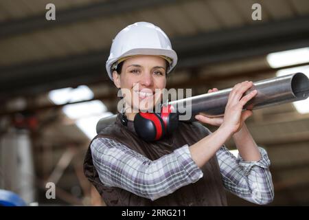happy female engineer working at power plant Stock Photo