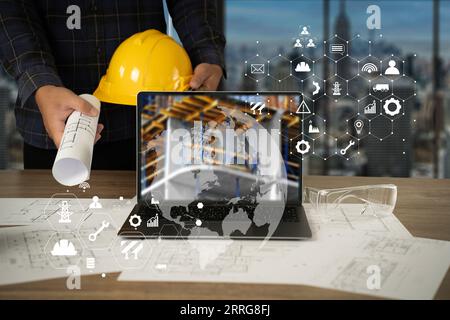 Engineer architect industry 4.0 using tablet construction site, industrial and innovation infographic at building futuristic architect control innovat Stock Photo