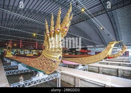 220518 -- BANGKOK, May 18, 2022 -- Photo taken on May 17, 2022 shows the royal barges at the National Museum of Royal Barges in Bangkok, Thailand. The National Museum of Royal Barges was established in Bangkok in 1972, with a total of 8 royal barges on display. The history of the Thai royal barges can be traced back to the royal ceremonies of the Sukhothai Kingdom around the 13th century.  THAILAND-BANGKOK-NATIONAL MUSEUM OF ROYAL BARGES WangxTeng PUBLICATIONxNOTxINxCHN Stock Photo