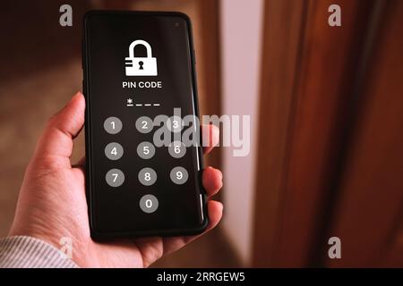 Woman accessing smartphone with pin code. Cyber security concept. Hacking and phishing topic. Mobile phone password access. Online threats. Stock Photo