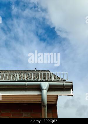 Roof Window In Velux Style With Black Roof Tiles Stock Photo