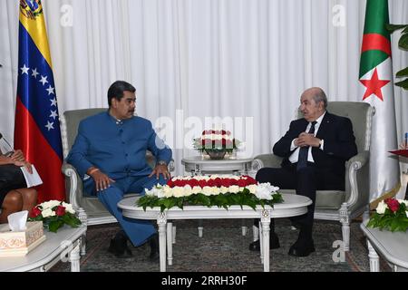 220610 -- ALGIERS, June 10, 2022 -- Algerian President Abdelmadjid Tebboune R meets with visiting Venezuelan President Nicolas Maduro in Algiers, Algeria, June 9, 2022. /Handout via Xinhua ALGERIA-ALGIERS-VENEZUELA-PRESIDENT-VISIT AlgerianxPresidency PUBLICATIONxNOTxINxCHN Stock Photo