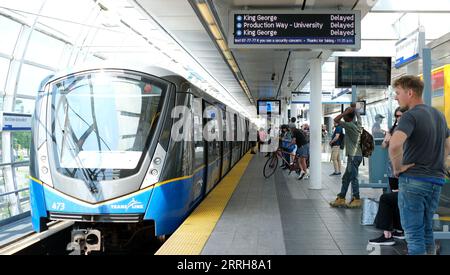 Sky Train train canceled all trains car breakdown people waiting on the platform red lights glowing in the window on the board the inscription canceled Vancouver-Canada 09.09.2023 Stock Photo