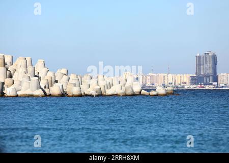 220620 -- ALEXANDRIA, June 20, 2022 -- Concrete barriers used against sea-level rises are seen along the coastline in Alexandria, Egypt, June 19, 2022. The Egyptian Ministry of Water Resources and Irrigation has launched a climate adaptation project on the North Coast and the Nile Delta to counter sea-level rises, the impact of weather hazards on low-lying coastal areas, and seawater intrusion.  EGYPT-ALEXANDRIA-CLIMATE CHANGE-RISING SEA LEVEL-COASTAL CONCRETE BARRIER AhmedxGomaa PUBLICATIONxNOTxINxCHN Stock Photo