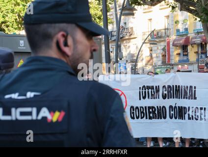 220630 -- MADRID, June 30, 2022 -- Police stand guard as demonstrators protest against the North Atlantic Treaty Organization NATO summit in the square of Tirso de Molina in Madrid, Spain, June 29, 2022. The 2022 Summit of the NATO opened here on Wednesday amid mounting criticisms of the military alliance s aggressive security policy and lingering conflicts among its members.  SPAIN-MADRID-NATO SUMMIT MengxDingbo PUBLICATIONxNOTxINxCHN Stock Photo