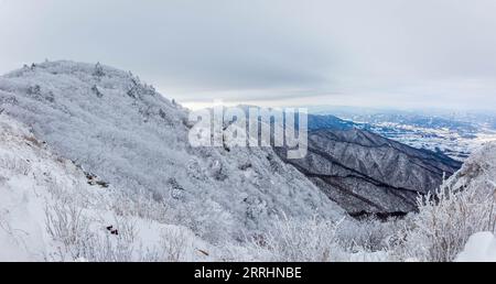 Snow-capped Deogyusan mountains on a clear day  in winter, South Korea. Stock Photo