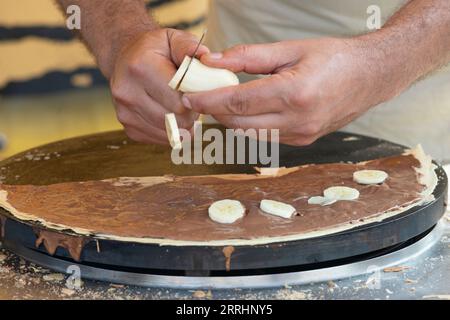 Italy, Lombardy, Food Festival, Making Crepes Stock Photo