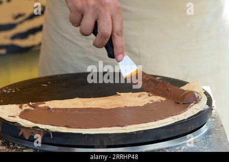 Italy, Lombardy, Food Festival, Making Crepes Stock Photo