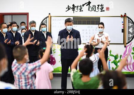 220714 -- URUMQI, July 14, 2022 -- Chinese President Xi Jinping, also general secretary of the Communist Party of China Central Committee and chairman of the Central Military Commission, visits the community of Guyuanxiang in the Tianshan District in the city of Urumqi, capital of northwest China s Xinjiang Uygur Autonomous Region, July 13, 2022.  CHINA-XINJIANG-URUMQI-XI JINPING-INSPECTION CN YanxYan PUBLICATIONxNOTxINxCHN Stock Photo