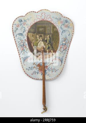 Hand screen depicting Dorval visiting his beloved, c.1769-c.1781. Cardboard hand screen covered with paper, showing an oval cut engraving of a scene from the French comedy 'Lucile' by Jean Fran&#xe7;ois Marmontel (1723-1799). Limewood handle. The play 'Lucile' was translated into Dutch in 1781 and published in Amsterdam. The story is set in France 'in the house of Timantes, on his estate'. Stock Photo