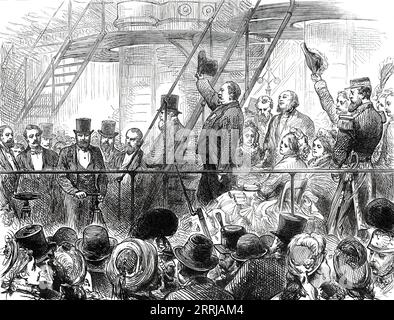 Opening of the American Centennial Exhibition: President Grant Starting the Machinery, from a sketch by our special artist, 1876. '...the procession entered Machinery Hall, where all was stillness prior to their coming, and surrounded the great Corliss engine. The President of the United States, the Emperor of Brazil, and Mr. G. Corliss then ascended the platform of the mammoth motor. The President having taken hold of the valve-lever of one engine and the Emperor of that of the other, both gave the turn simultaneously; steam was on; the great walking-beams began to ascend and descend; the eng Stock Photo