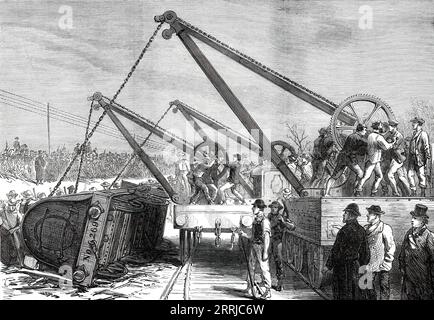 The Railway Accident at Abbotts Ripton, Huntingdon: raising an engine from the wrecked train, 1876. On 21 January 1876, the Edinburgh-London Special Scotch Express was involved in a collision, during a blizzard, with a coal train on the Great Northern Railway main line. A second collision occurred minutes later when an express to Leeds crashed into the wreckage obstructing the northbound line. Thirteen passengers died, and 53 passengers and 6 traincrew members were injured. Factors included signal failure, bad weather and poor visibility. Snow and ice on the wires by which the semaphore arm sh Stock Photo