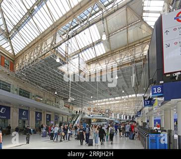 Main concourse at Waterloo Station, London, UK. Shows hanging scaffolding platforms for refurbishment and replacement of the roof glazing, summer 2023 Stock Photo