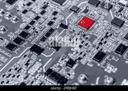China flag on a processor, CPU Central processing Unit or GPU microchip on a motherboard. China develop own chip. Stock Photo
