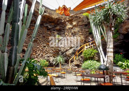 Punta Mujeres, Lanzarote, Canary Islands, Spain - March 30, 2023: the al fresco restaurant of Jameos del Agua lava caves, designed by Cesar Manrique. Stock Photo