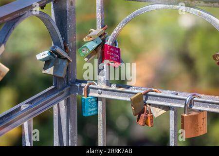Europe, Croatia, Primorje-Gorski Kotar County, island of Rab, Love padlocks on a iron fence in the old town of Rab Stock Photo