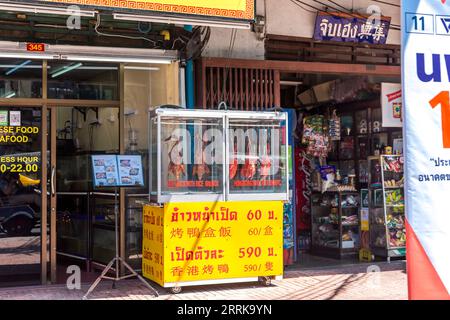 Roasted ducks sale, Small street with stores, Bangkok, Thailand, Asia Stock Photo