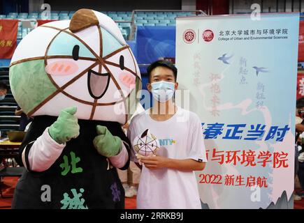 220828 -- BEIJING, Aug. 28, 2022 -- A freshman poses for a photo at Peking University in Beijing, capital of China, on Aug. 28, 2022. Freshmen came to register at Peking University on Sunday.  CHINA-BEIJING-PEKING UNIVERSITY-NEW STUDENTS CN RenxChao PUBLICATIONxNOTxINxCHN Stock Photo