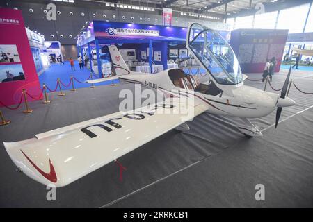 220901 -- CHANGSHA, Sept. 1, 2022 -- A light sport aircraft is displayed during the 2022 Hunan International General Aviation Industry Expo at the Changsha International Convention and Exhibition Center in Changsha, central China s Hunan Province, Sept. 1, 2022. The 2022 Hunan International General Aviation Industry Expo opened here on Thursday. The expo comprises a static exhibition at the Changsha International Convention and Exhibition Center in Changsha and an air show at the Lusong Airport of Zhuzhou City, both in central China s Hunan Province.  CHINA-HUNAN-CHANGSHA-GENERAL AVIATION-EXPO Stock Photo