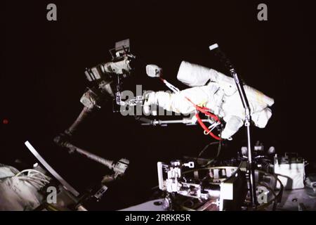 220917 -- BEIJING, Sept. 17, 2022 -- Screen image captured at Beijing Aerospace Control Center on Sept. 17, 2022 shows Shenzhou-14 astronaut Cai Xuzhe conducting extravehicular activities EVAs. China s Shenzhou-14 astronauts Cai Xuzhe and Chen Dong successfully exited the space station lab module Wentian on Saturday to conduct EVAs, according to the China Manned Space Agency CMSA.  EyesonSciCHINA-WENTIAN-SHENZHOU-14 ASTRONAUTS-EXTRAVEHICULAR ACTIVITIES CN GuoxZhongzheng PUBLICATIONxNOTxINxCHN Stock Photo