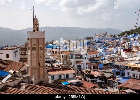 Panoramic view of famous blue colored city Chefchaouen and the Grand Mosque, Morocco Stock Photo